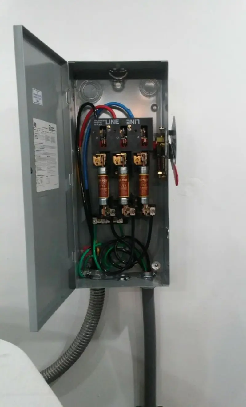 Three-phase disconnect switch installed for Smoke Detector Installation in Buckner